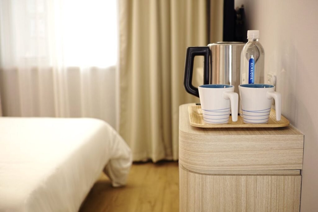 Two White Ceramic Mug on Brown Wooden Tray